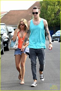 ashley-tisdale-orange-one-piece-07.jpg