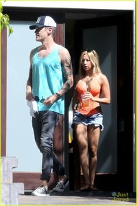 ashley-tisdale-orange-one-piece-16.jpg
