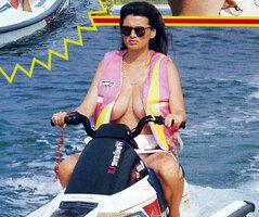 serena-grandi-topless-aquascooter-2.jpg