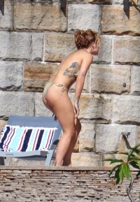 rita-ora-in-bikini-at-a-pool-in-sydney-03-31-2021-8.jpg