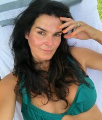 angie harmon in bikini top.jpg